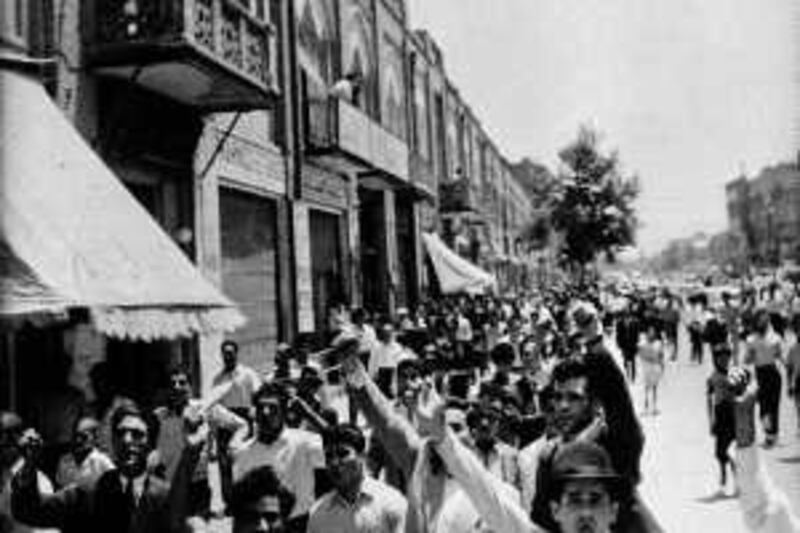 Pro-Premier Mossadegh protesters shout in the streets of Tehran during a demonstration, July 20, 1952. (AP Photo)