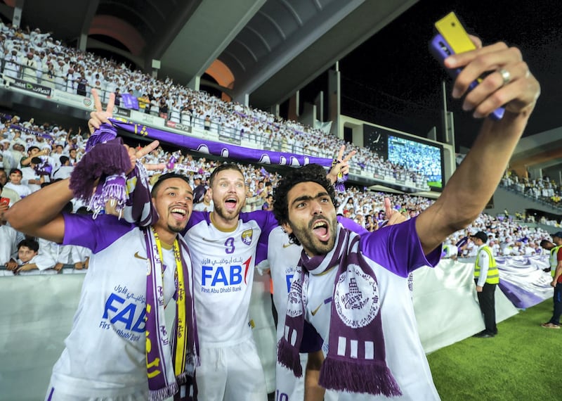 Abu Dhabi, UAE.  May 3, 2018.   President's Cup Final, Al Ain FC VS. Al Wasl.  (L-R) Ahmed Barman celebrates with Matkus Berg.
Victor Besa / The National
Sports
Reporter: John McAuley