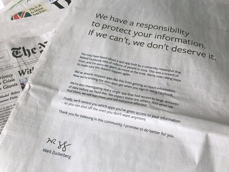 An advertisement in The New York Times is displayed on Sunday, March 25, 2018, in New York. Facebookâ€™s CEO apologized for the Cambridge Analytica scandal with ads in multiple U.S. and British newspapers Sunday. The ads signed by Mark Zuckerberg say the social media platform doesnâ€™t deserve to hold personal information if it canâ€™t protect it. (AP Photo/Jenny Kane)