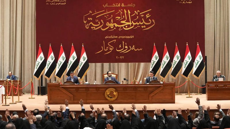 Iraqi politicians during a parliamentary session in Baghdad. The divided parliament will vote on the Emergency Law for Food Security and Development bill today. EPA