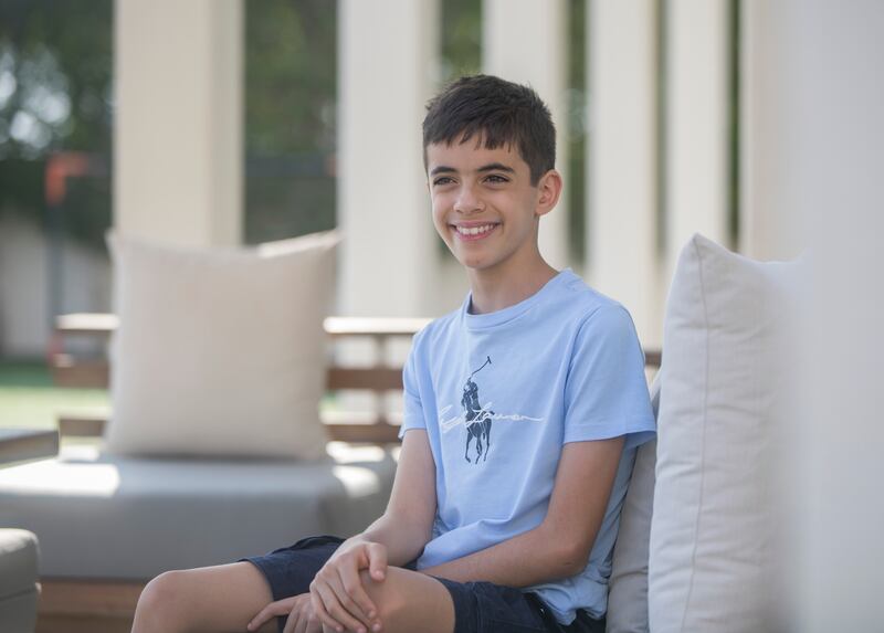 Adam El Rafey, 12, is a freshman at the University of Wollongong in Dubai, the youngest student to ever attend the school. Ruel Pableo / The National