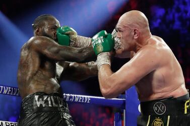 Tyson Fury lands a right to Deontay Wilder during their WBC heavyweight rematch in Las Vegas in February. AP