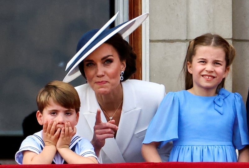 Kate, Duchess of Cambridge, along with Princess Charlotte, and Prince Louis appear on the balcony of Buckingham Palace. Reuters