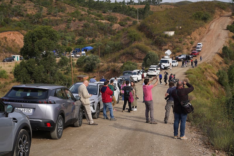 Media at Barragem do Arade reservoir The child's disappearance led to worldwide interest, but has never been solved. PA