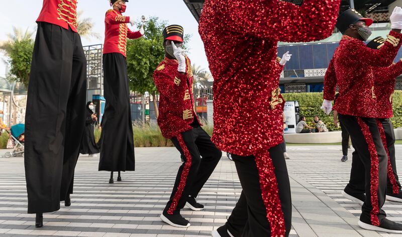 Festive performers reach new heights at the world's fair.