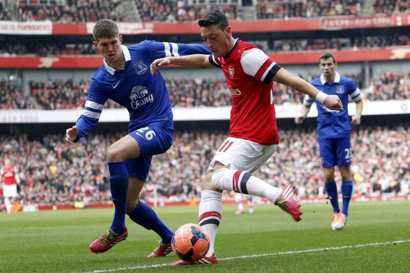 Centre midfield: Mesut Ozil, Arsenal. Looked back to his best with a classy display against Everton. Ended his goal drought and created another. Tal Cohen / EPA