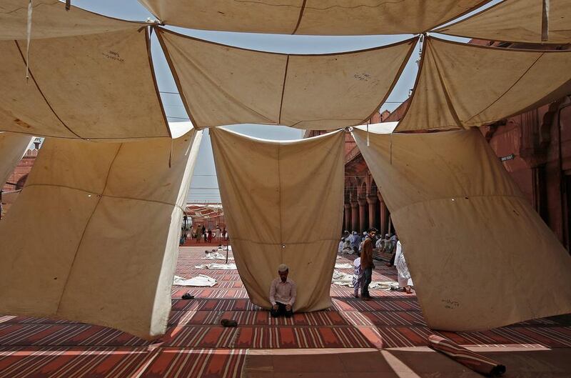 Muslims offer the first Friday prayers of the holy month of Ramadan at the Jama Masjid (Grand Mosque) in the old quarters of Delhi, India. Adnan Abidi / Reuters