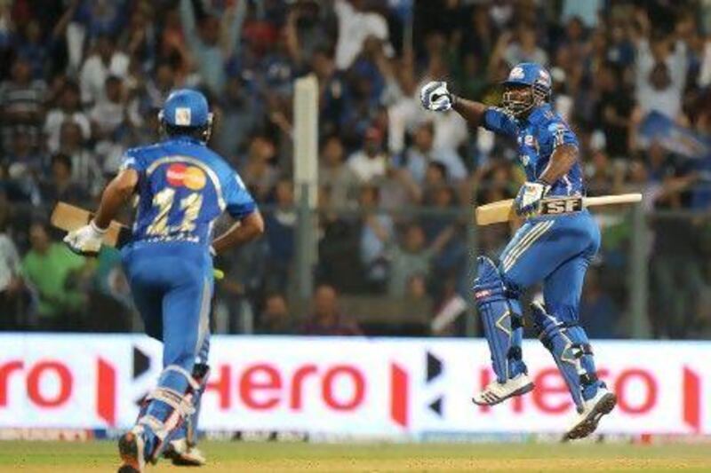 Dwayne Smith hit 24 runs off just nine balls to lead Mumbai Indians to an unlikely win over Chennai Super Kings last night. Rajanish Kakade / AP Photo