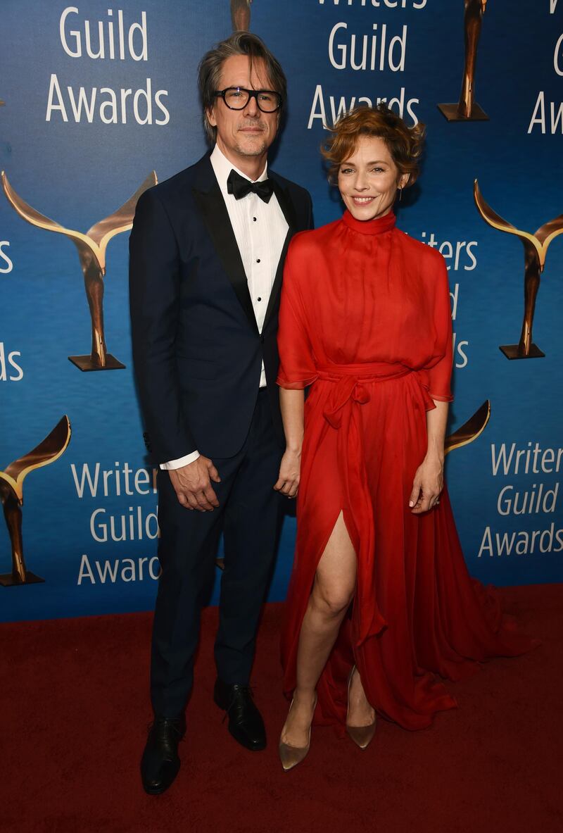 Screenwriter Charles Randolph, left, recipient of the Paul Selvin Award for his script for the film 'Bombshell', poses with his wife Mili Avital at the 2020 Writers Guild Awards at the Beverly Hilton. AP