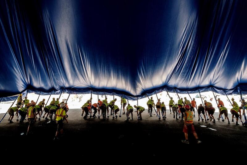 Workers set up the venue in preparation for the Cirque du Soleil show in Maspalomas, Canary Islands, Spain. EPA