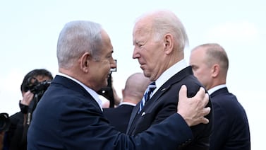 Israeli Prime Minister Benjamin Netanyahu greets US President Joe Biden in Tel Aviv in October last year. Mr Biden has faced criticism as the US continues to send military aid to Israel. AFP