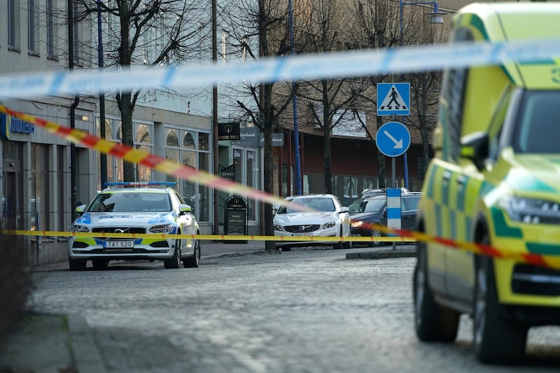 Police cars are seen at a knife attack site in the southern town of Vetlanda, Sweden March 3, 2021. REUTERS/Carl Carlert NO RESALES. NO ARCHIVES. SWEDEN OUT. NO COMMERCIAL OR EDITORIAL SALES IN SWEDEN