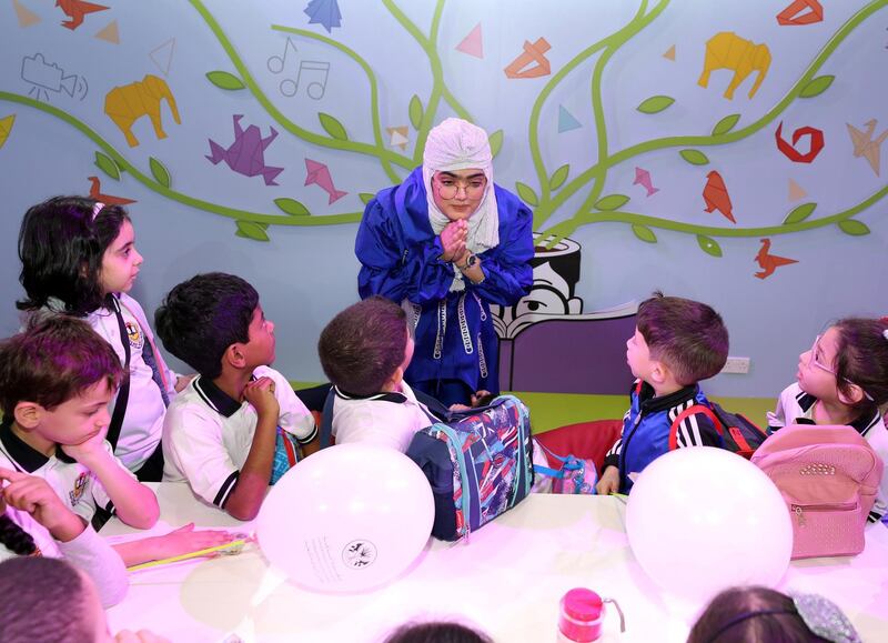 Sharjah, United Arab Emirates - April 18, 2019: Hajar Yousef tells stories in arabic at Sharjah children's reading festival. Thursday the 18th of April 2019. Expo Centre, Sharjah. Chris Whiteoak / The National