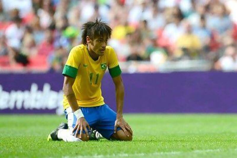 Brazil's forward Neymar went down on his knees dejected after the loss.