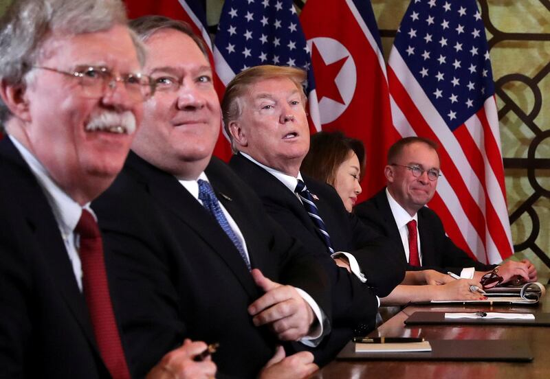 FILE PHOTO: U.S. President Donald Trump, U.S. Secretary of State Mike Pompeo, White House national security adviser John Bolton and acting White House Chief of Staff Mick Mulvaney attend the extended bilateral meeting in the Metropole hotel with North Korea's leader Kim Jong Un and his delegation during the second North Korea-U.S. summit in Hanoi, Vietnam February 28, 2019. REUTERS/Leah Millis/File Photo
