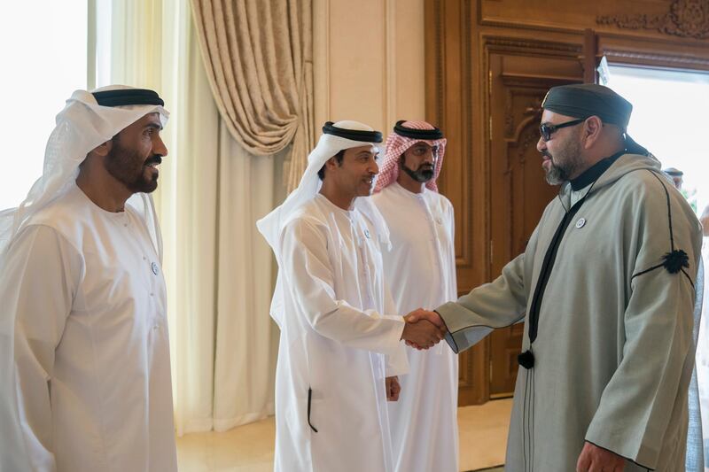 ABU DHABI, UNITED ARAB EMIRATES - September 10, 2018: HH Sheikh Hazza bin Zayed Al Nahyan, Vice Chairman of the Abu Dhabi Executive Council (2nd L), greets HM King Mohamed VI of Morocco (R), during a Sea Palace barza. Seen with HH Sheikh Nahyan Bin Zayed Al Nahyan, Chairman of the Board of Trustees of Zayed bin Sultan Al Nahyan Charitable and Humanitarian Foundation (L) and HH Sheikh Ammar bin Humaid Al Nuaimi, Crown Prince of Ajman (3rd L).

( Mohamed Al Hammadi / Crown Prince Court - Abu Dhabi )
---