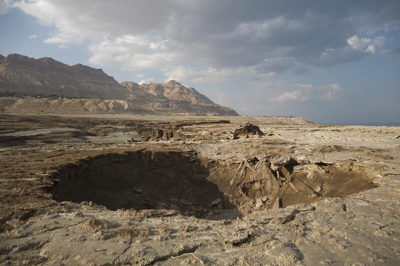 A large sinkhole created by the decrease in water level at the Dead Sea coastal resort near Ein Gedi.