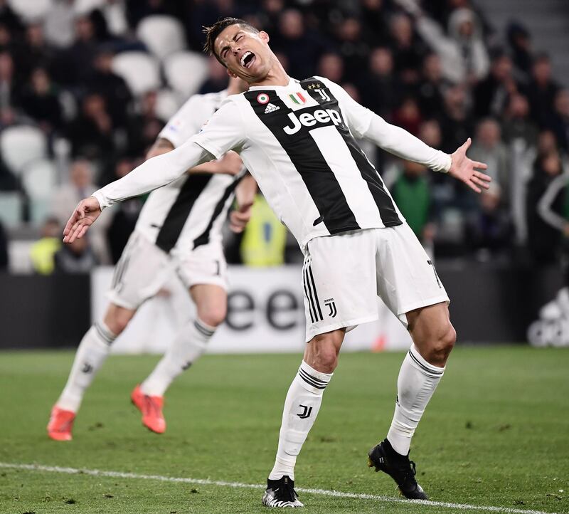 Juventus' Portuguese forward Cristiano Ronaldo reacts after a missed goalscoring opportunity. AFP