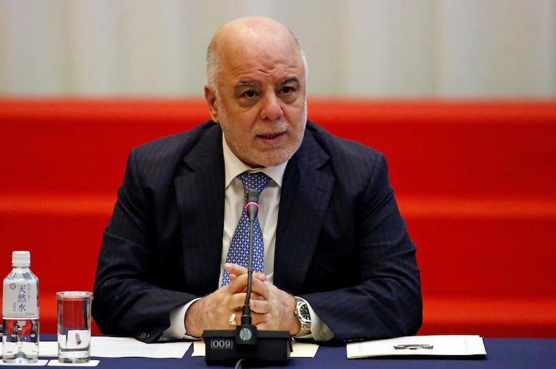 Iraqi Prime Minister Haider al-Abadi speaks during the Tokyo Conference on Supporting Job Creation and Vocational Training to Facilitate Weapons Reduction for Iraqi Society in Tokyo, Japan, April 5, 2018.  REUTERS/Toru Hanai