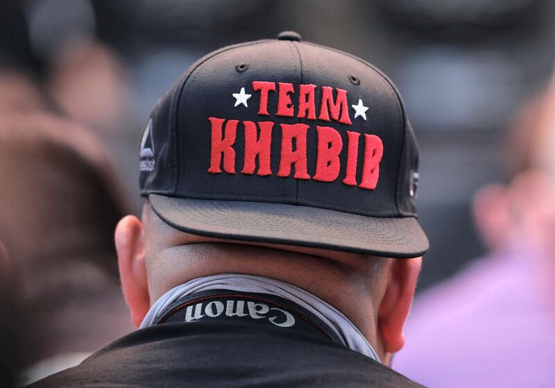 Abu Dhabi, United Arab Emirates - September 06, 2019: A fight fan wears a hat for Khabib Nurmagomedov at UFC 242. Friday the 6th of September 2019. Yes Island, Abu Dhabi. Chris Whiteoak / The National