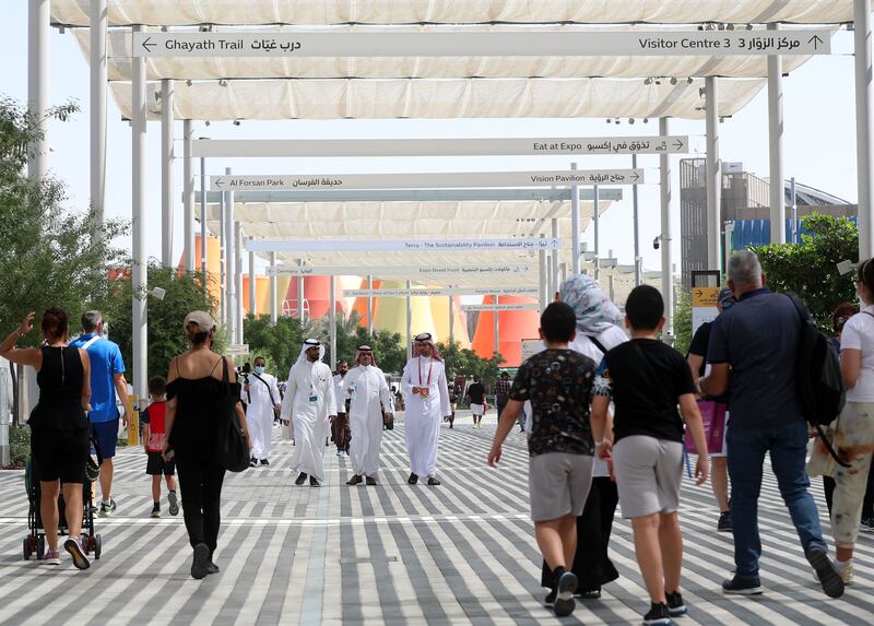 Visitors explore the Expo site.