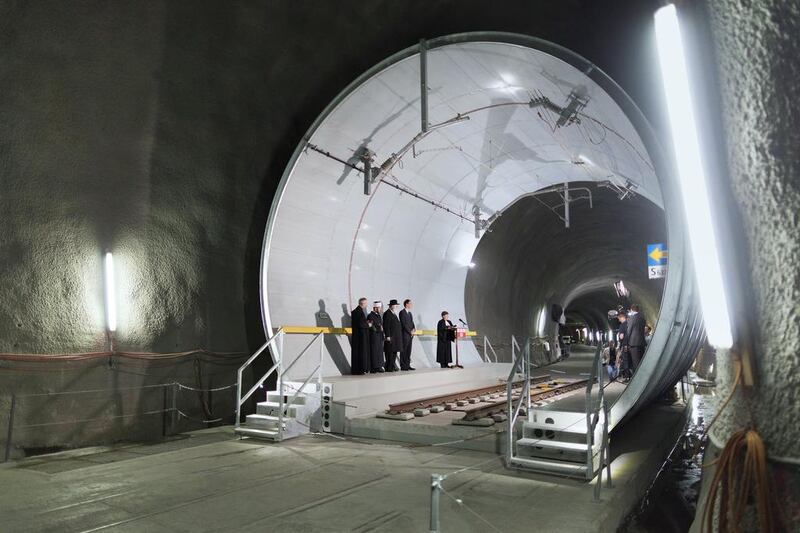 Priests present for the blessing of the Gotthard tunnel on the opening day. Gartan Bally / EPA