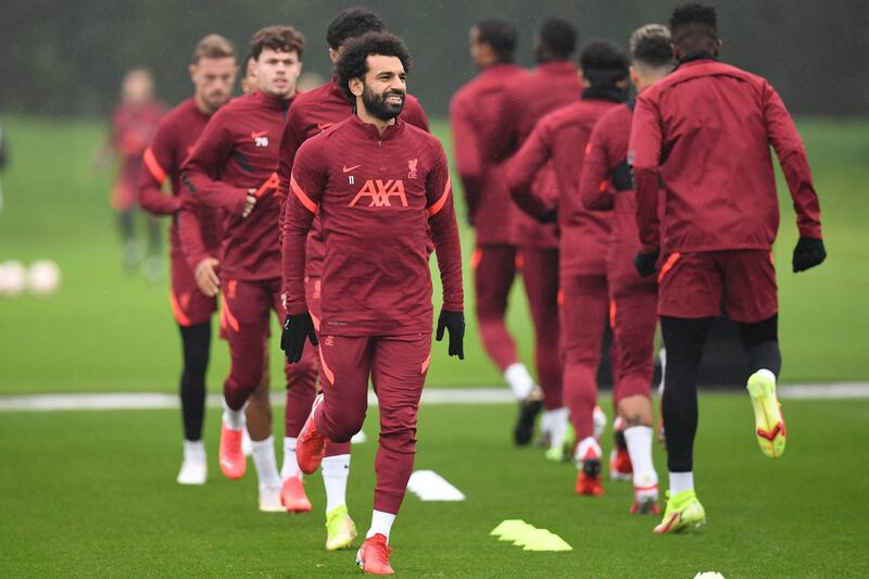Liverpool's Egyptian midfielder Mohamed Salah attends a training session at their Melwood training ground in Liverpool, north west England, on October 18, 2021, on the eve of their UEFA Champions League Group B football match against Atletico Madrid.  (Photo by Paul ELLIS  /  AFP)