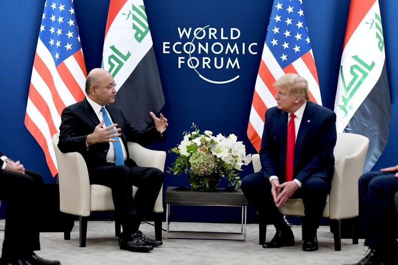 U.S. President Donald Trump meets with Iraq's President Barham Salih during the 50th World Economic Forum (WEF) annual meeting in Davos, Switzerland, January 22, 2020. The Presidency of the Republic of Iraq Office/Handout via REUTERS ATTENTION EDITORS - THIS IMAGE WAS PROVIDED BY A THIRD PARTY.