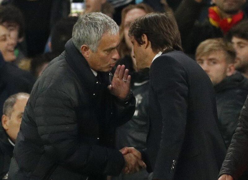 Jose Mourinho, left, and Antonio Conte, right, have been engaged in an escalating war of words in recent weeks. John Sibley / Reuters