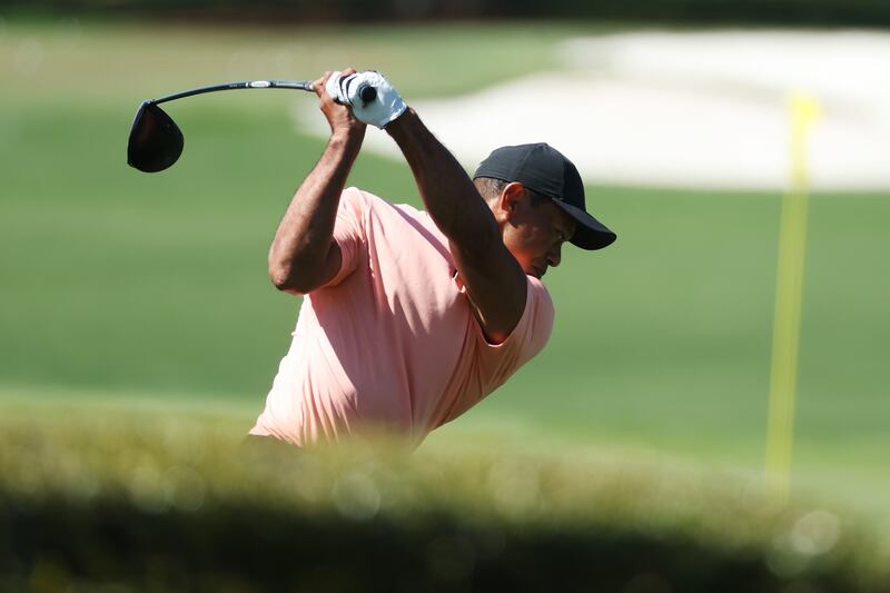 Tiger Woods hits a driver during practice at Augusta National Golf Club. Getty