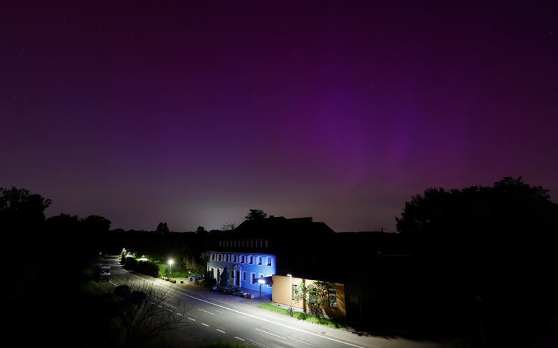 The Northern Lights shine above a hotel in Speyer, Germany. EPA