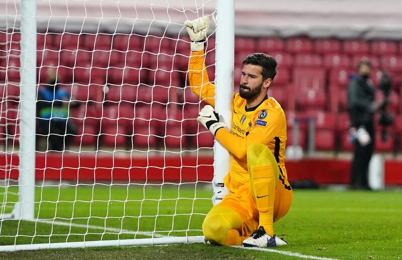 LIVERPOOL RATINGS: Alisson Becker - 6, Made a good first-half save at the near post from Gosens. Alert and quick off the line. Could do little about either goal. EPA