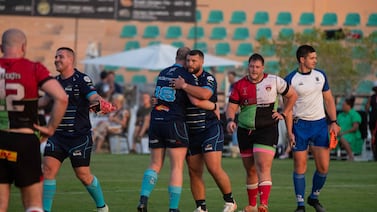 Dubai Sharks, in dark blue, won the UAE Division 1 title after beating Abu Dhabi Harlequins II, which means they are eligible to join the West Asia Premiership next season. Ruel Pableo for The National