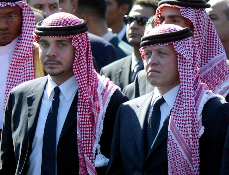 Prince Ali with his half brother King Abdullah of Jordan as they walk together in the funeral procession of Palestinian President Yasser Arafat in Cairo on November 12, 2004. EPA, file