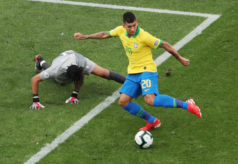 Roberto Firmino scores Brazil's second goal on 19 minutes. Reuters