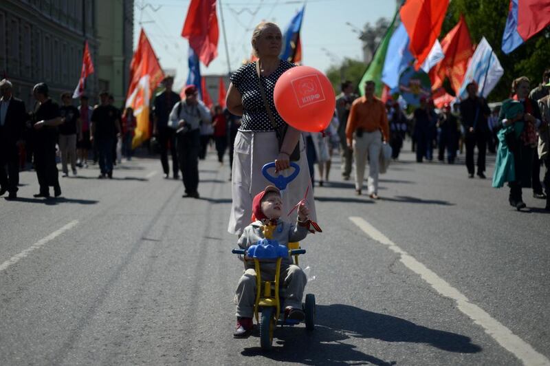 Russian Communist Party activists parade in central Moscow during their traditional May Day rally. Kirill Kudryavtsev / AFP Photo