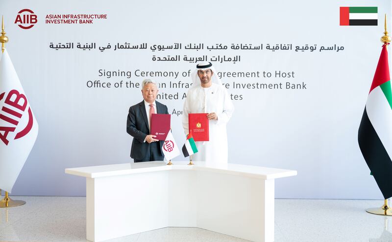 Dr Sultan Al Jaber, President-designate of the Cop28 summit and UAE governor of the Asian Infrastructure Investment Bank, and Jin Liqun, president of the AIIB, at the signing of the agreement to open its office in Abu Dhabi. Photo: AIIB