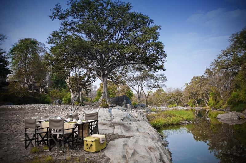 The outdoor dining at Banjaar Tola, a Taj-managed luxury safari lodge located near Kanha National Park in Madhya Pradesh, India. Courtesy Taj Hotels Resorts & Palaces