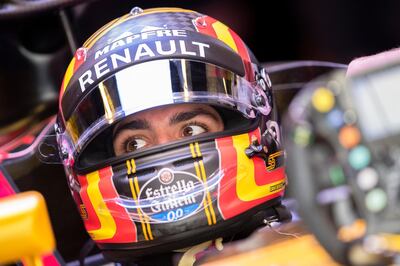 epa06349765 Spanish Formula One driver Carlos Sainz of Renault sits in his car during the third practice session at Yas Marina Circuit in Abu Dhabi, United Arab Emirates, 25 November 2017. The Formula One Grand Prix of Abu Dhabi will take place on 26 November 2017.  EPA/VALDRIN XHEMAJ