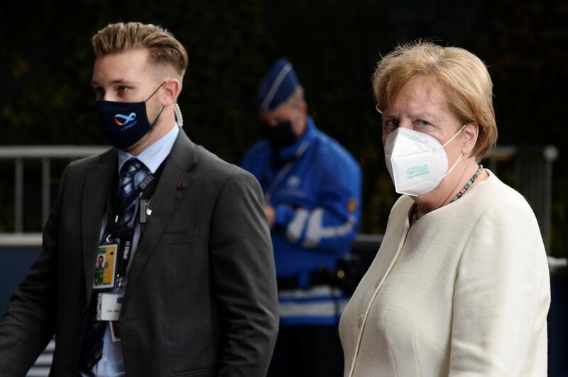 German Chancellor Angela Merkel departs from a meeting at the EU summit. Reuters