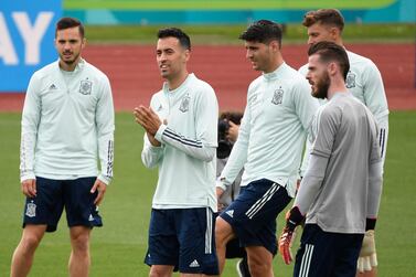 Spain's midfielder Sergio Busquets (2L), Spain's forward Alvaro Morata (3R) and teammates take part in their MD-1 training session at Las Rozas near Madrid on June 22, 2021, the eve of their UEFA EURO 2020 Group E football match against Slovakia. / AFP / PIERRE-PHILIPPE MARCOU