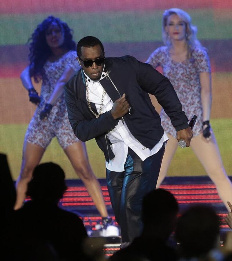 Rapper P Diddy performs during the NBA All Star basketball game. Gerald Herbert / AP photo