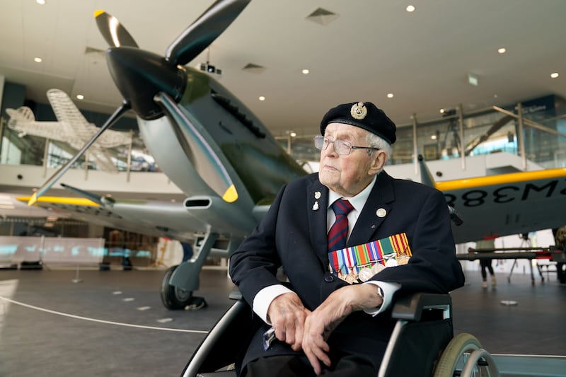 Norman Lewis, a 102-year-old Dunkirk veteran, next to the Spitfire. PA
