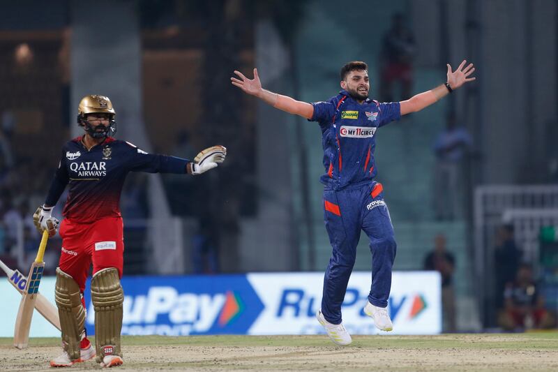 Lucknow Super Giants' Naveen-ul-Haq successfully appeals for the wicket of Royal Challengers Bangalore's Mahipal Lomror. AP Photo