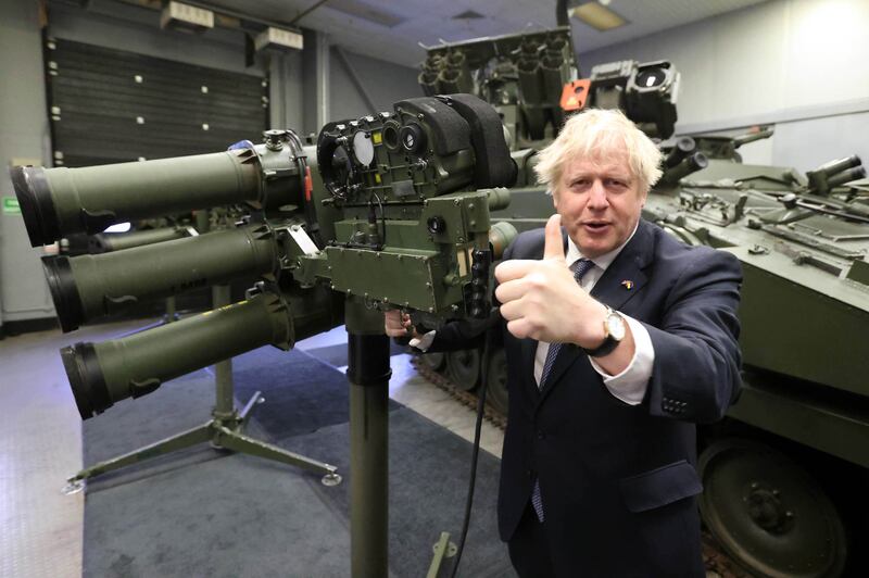 Boris Johnson with a Mark 3 shoulder launch missile system at Thales weapons manufacturer during a visit to Northern Ireland for talks, in May 2022 in Belfast. Getty Images