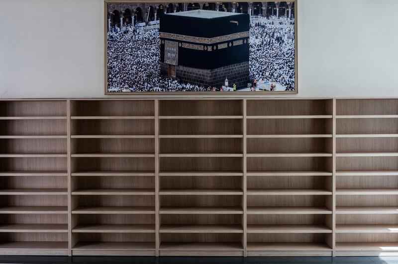 An empty shoe shelf at the Islamic Cultural Centre and Mosque in Madrid, Spain, on Thursday, April 23, 2020. AP