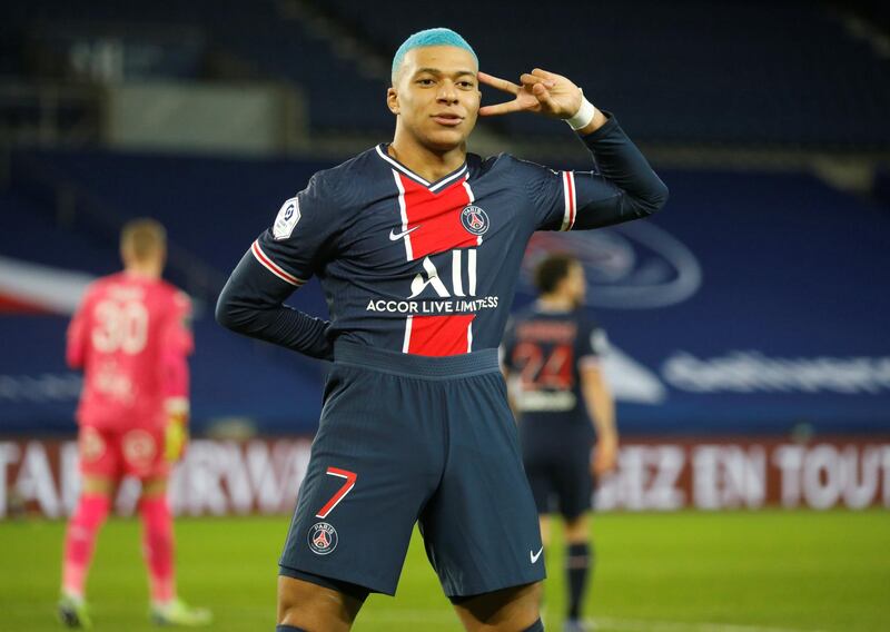 Soccer Football - Ligue 1 - Paris St Germain v Lorient - Parc des Princes, Paris, France - December 16, 2020 Paris St Germain's Kylian Mbappe celebrates scoring their first goal REUTERS/Charles Platiau     TPX IMAGES OF THE DAY