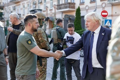 Ukrainian President Volodymyr Zelenskyy (left) shaking hands with UK Prime Minister Boris Johnson on his last visit to Ukraine in August. PA