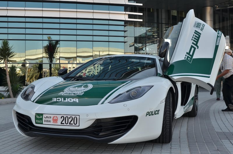 Dubai Police take receipt of a McLaren MP4-12C .Courtesy Dubai Police *** Local Caption ***  na26de-car.JPG