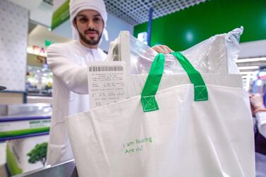 Abu Dhabi, United Arab Emirates, March 10, 2020. Lulu Hypermarket going plastic bag free and cleanliness-conscious to combat the Covid-19 outbreak. Rashid Awad checking out using reusable grocery bags. Victor Besa / The National Section: NA Reporter: Haneen Dajani